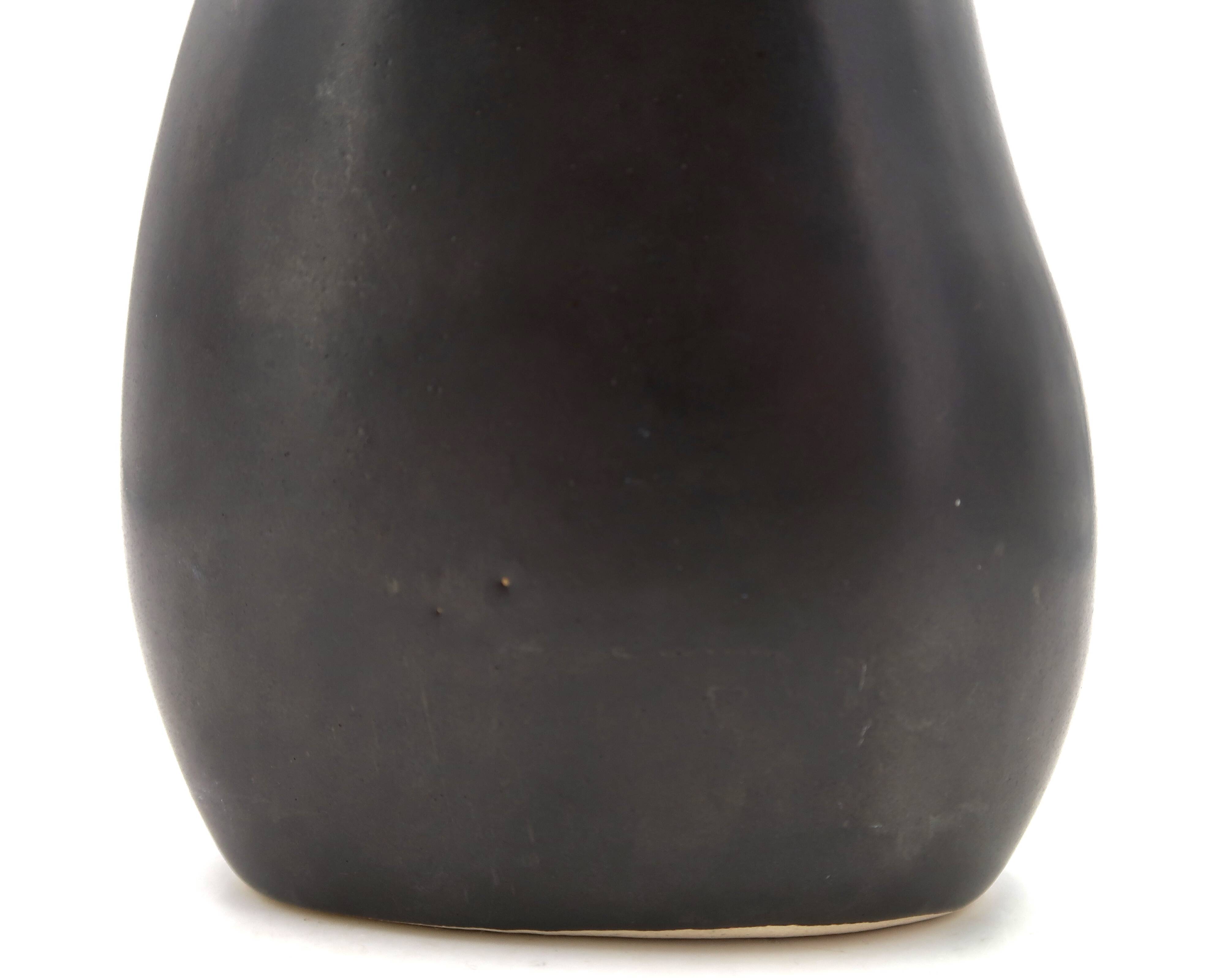 Free-form black signed candle holder, 1960s