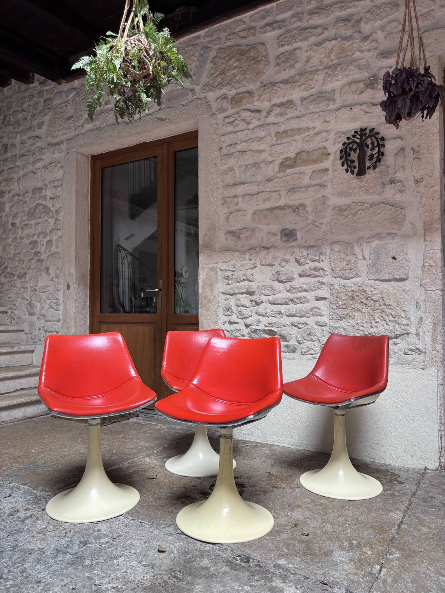Tulip leg armchairs