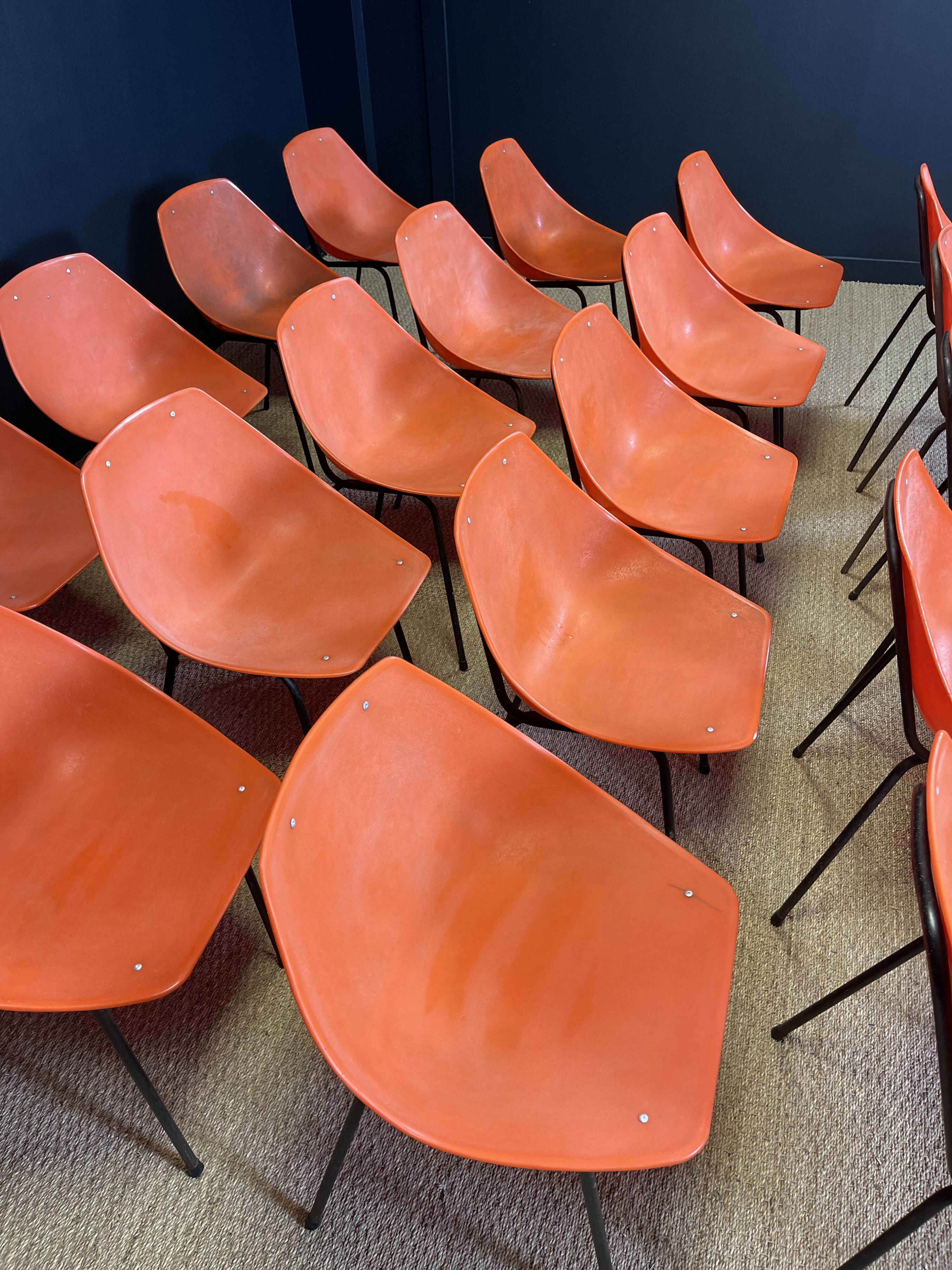 Set of 24 orange Guariche chairs