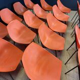Set of 24 orange Guariche chairs