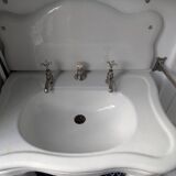Set of a sink and its retro ceramic splashback.