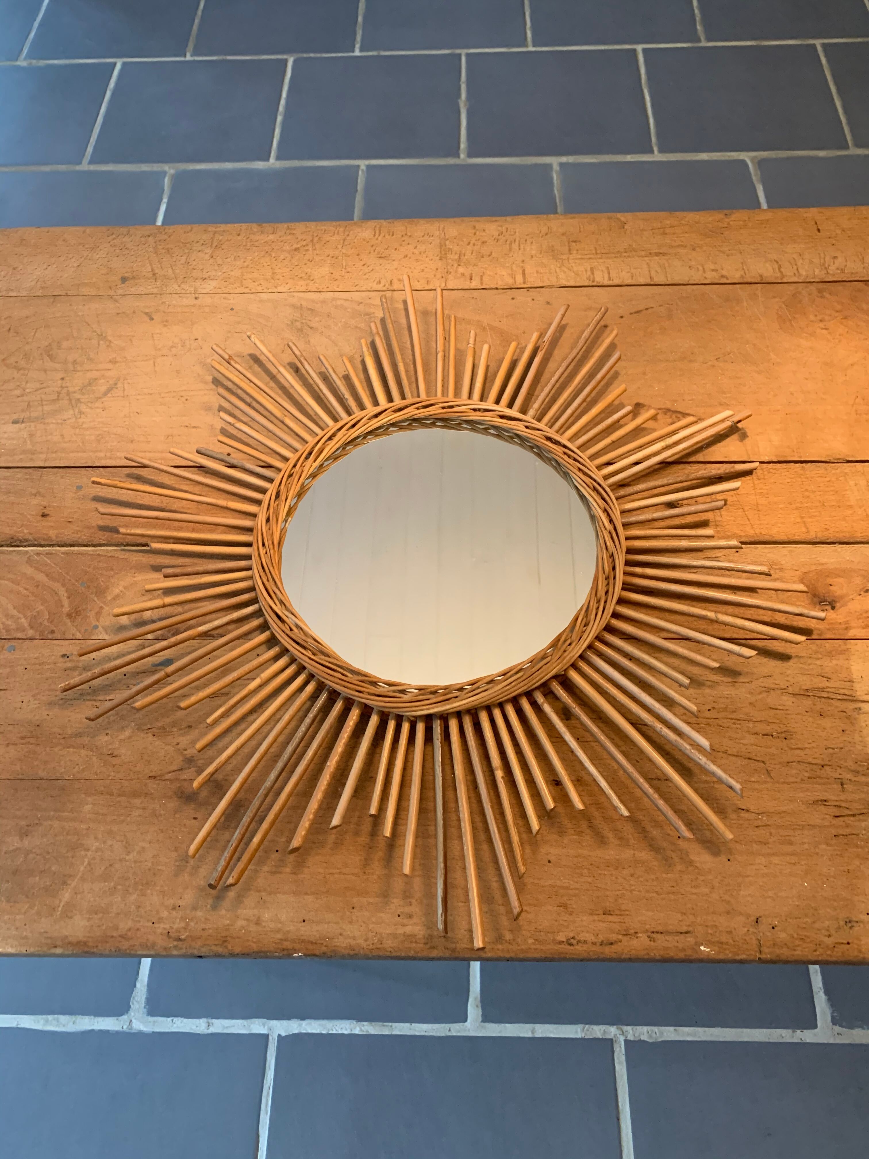 Vintage rattan sun mirror