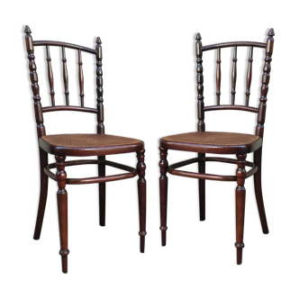 Pair of chairs canned by Fischel