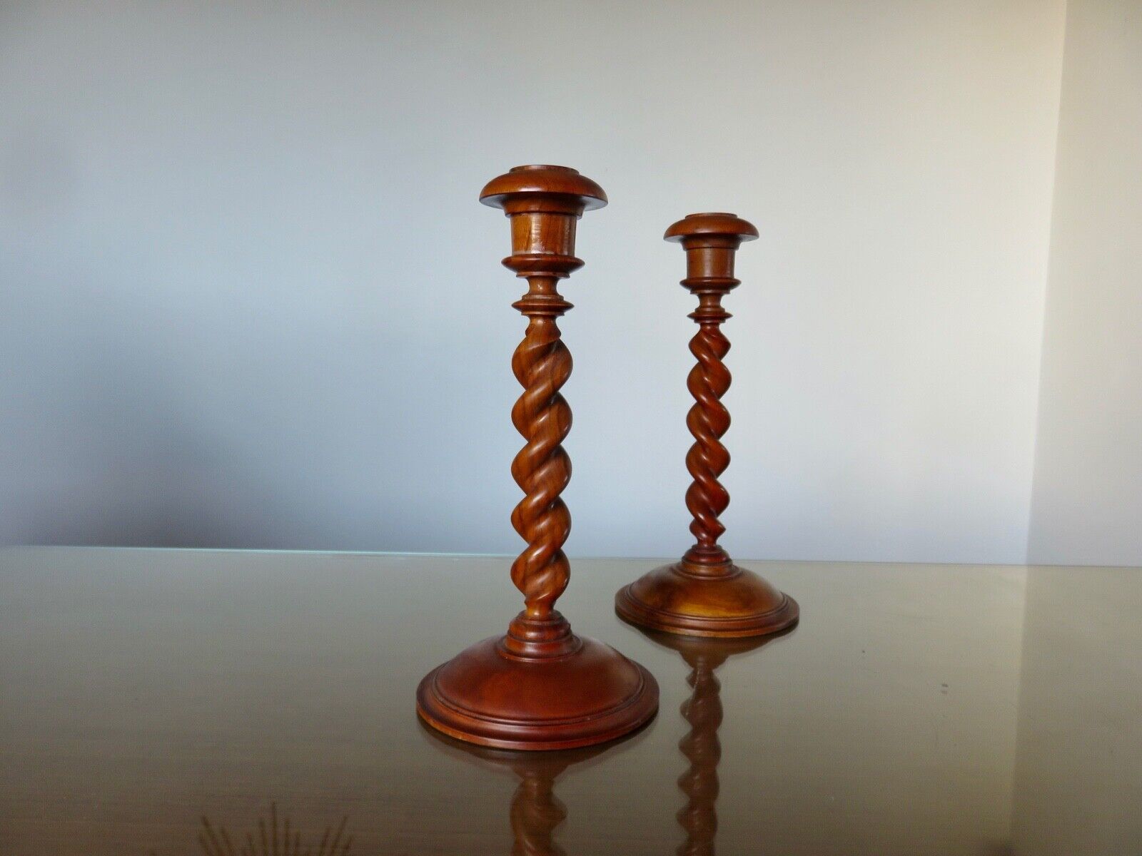 Pair of wooden candle holders turned art deco