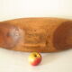 Brutalistic cut in exotic wood boomerang shape
