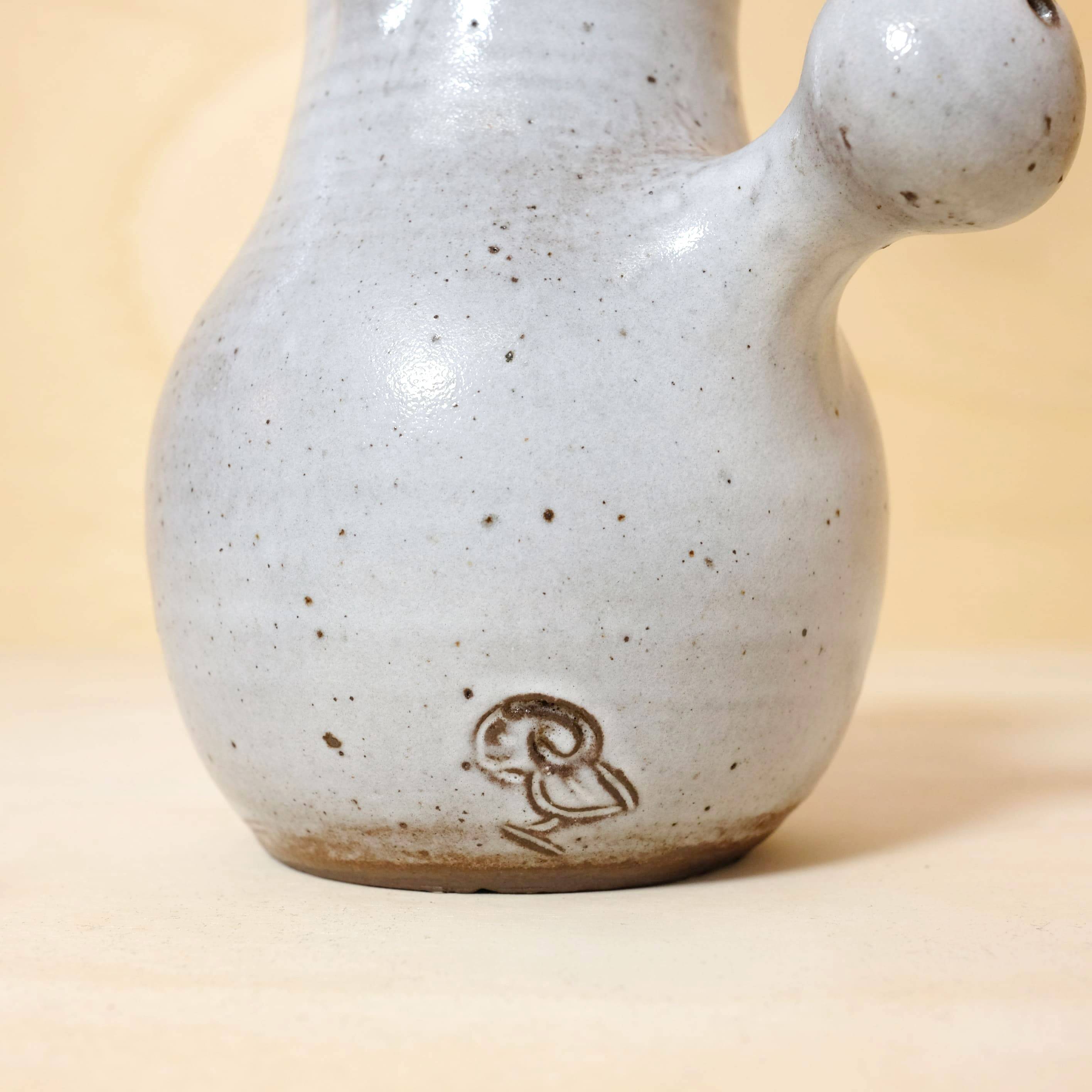 Jeanne and Norbert Pierlot, enamelled stoneware teapot and stopper, 26cm.