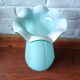 Large light blue opaline vase with a wavy neck.