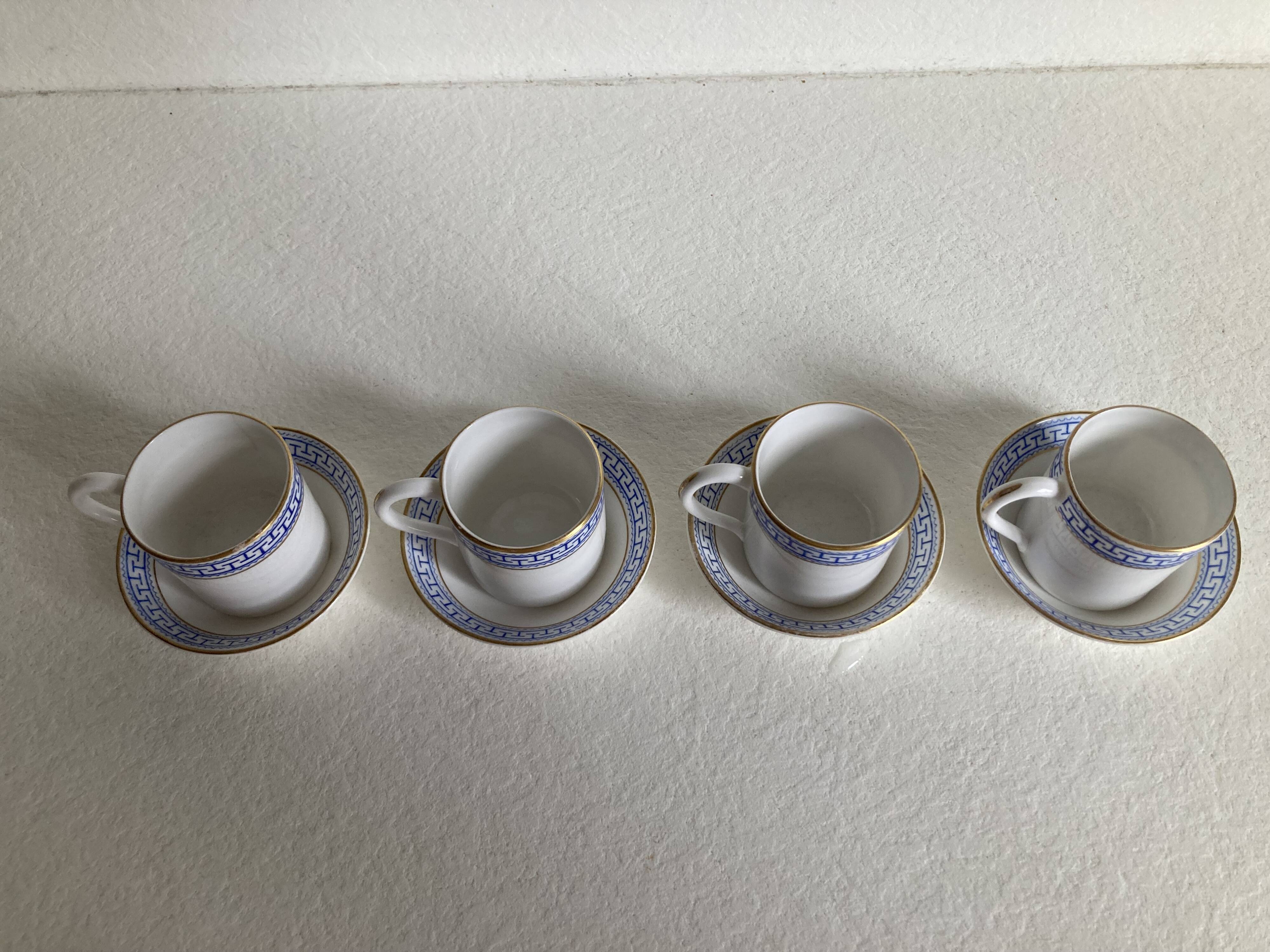 4 coffee cups and saucers