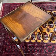 Set of English nesting tables in mahogany from the 1950s.