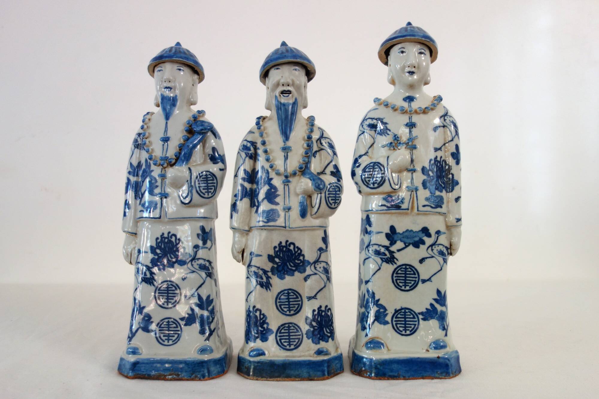 3 figurines of emperors from the Qing dynasty, China, early 20th century.