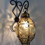 Italian vintage wall lamp in yellow blown glass and wrought iron. Year 70 80