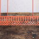 Vintage shelf in red openwork metal