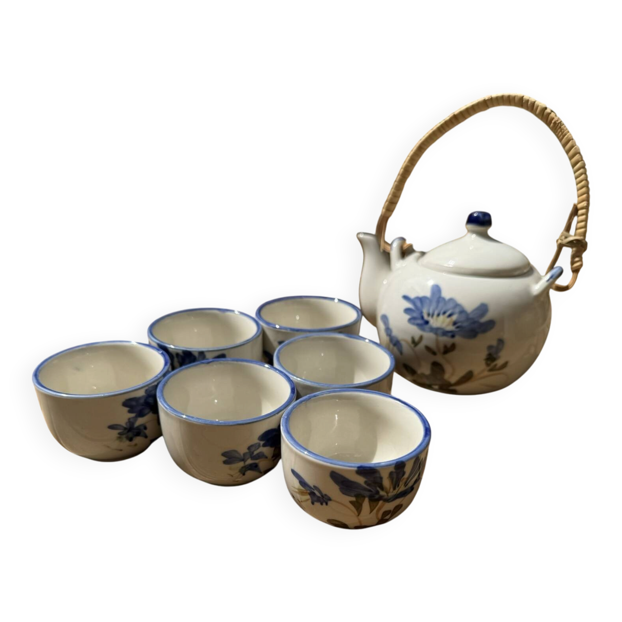 Vintage ceramic tea set for 6 bowls and a teapot.