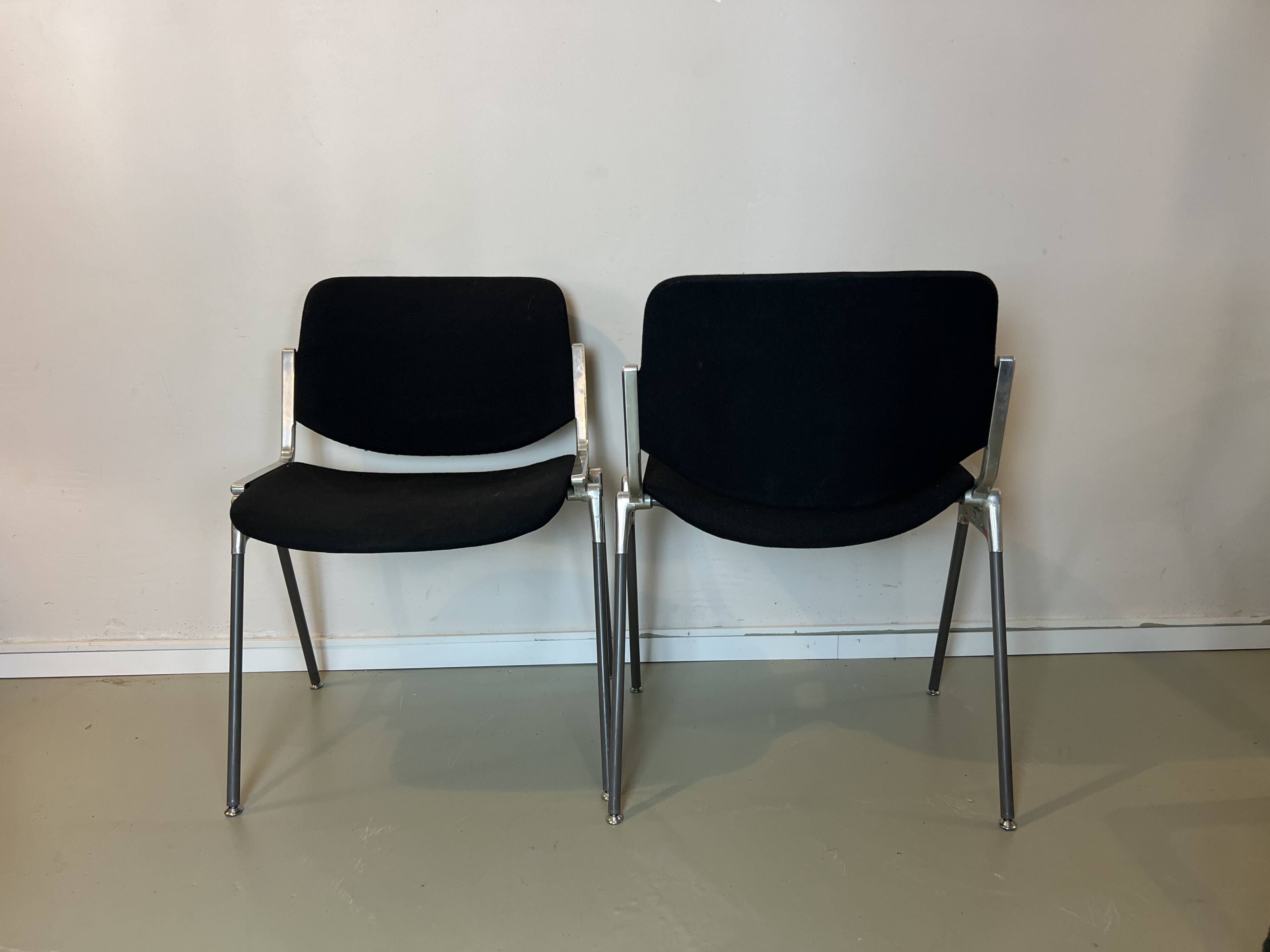 Black DSC chairs by Giancarlo Piretti for Castelli from the 60s/70s.