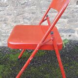 Red metal folding chair, 80s/90s