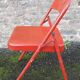 Red metal folding chair, 80s/90s