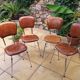 Lot of 4 vintage chairs in skai camel croc effect