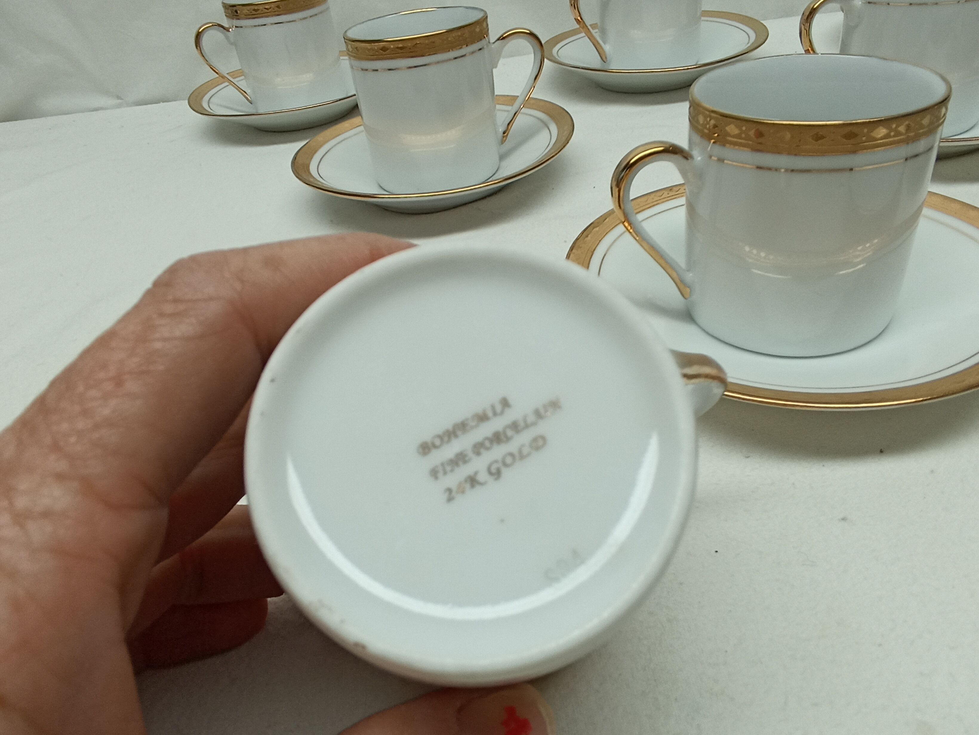 12 cups, porcelain coffee service with 24 carat gold gilding