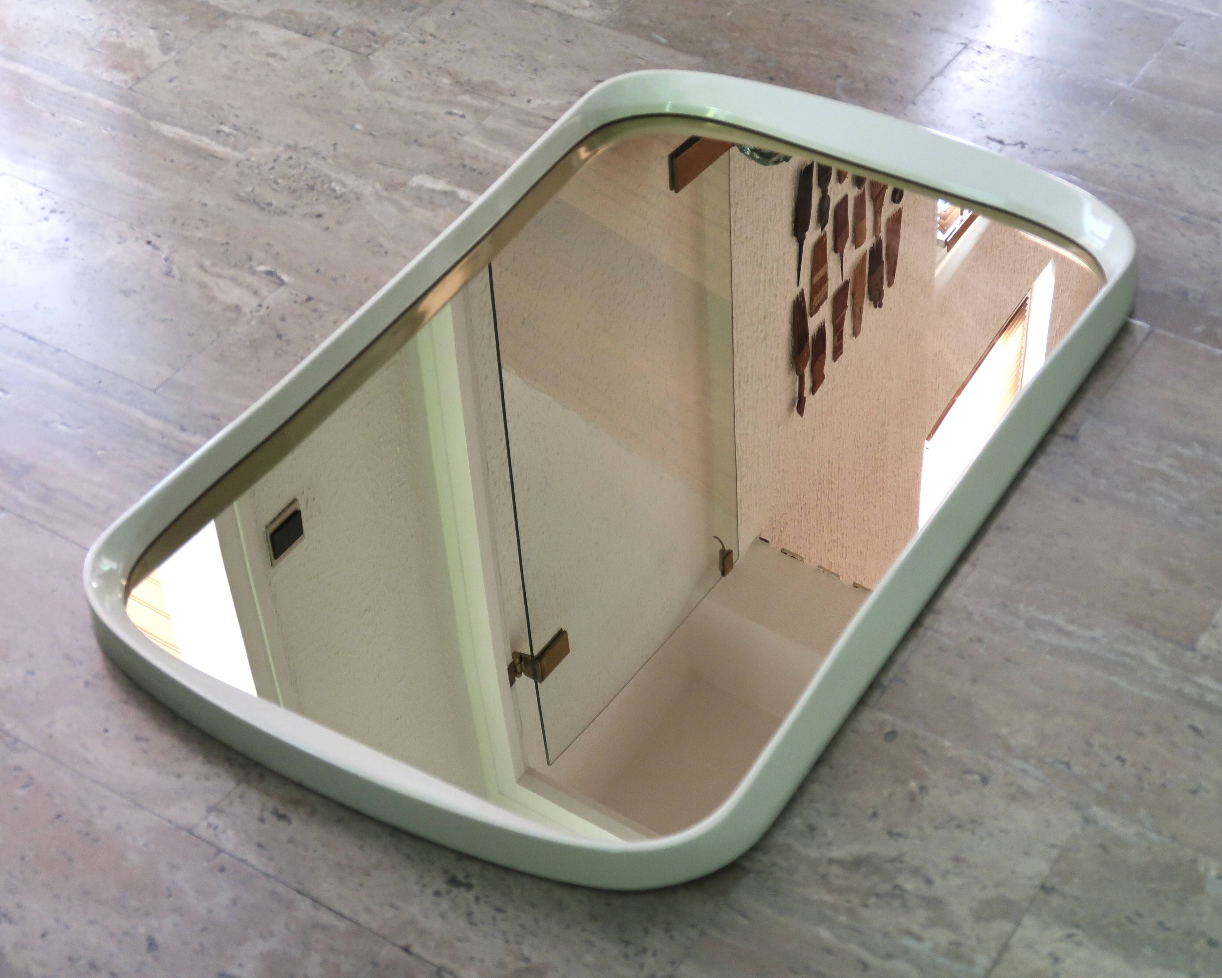 Rectangular mirror, horizontal or vertical, in white lacquered wood, 1970s.