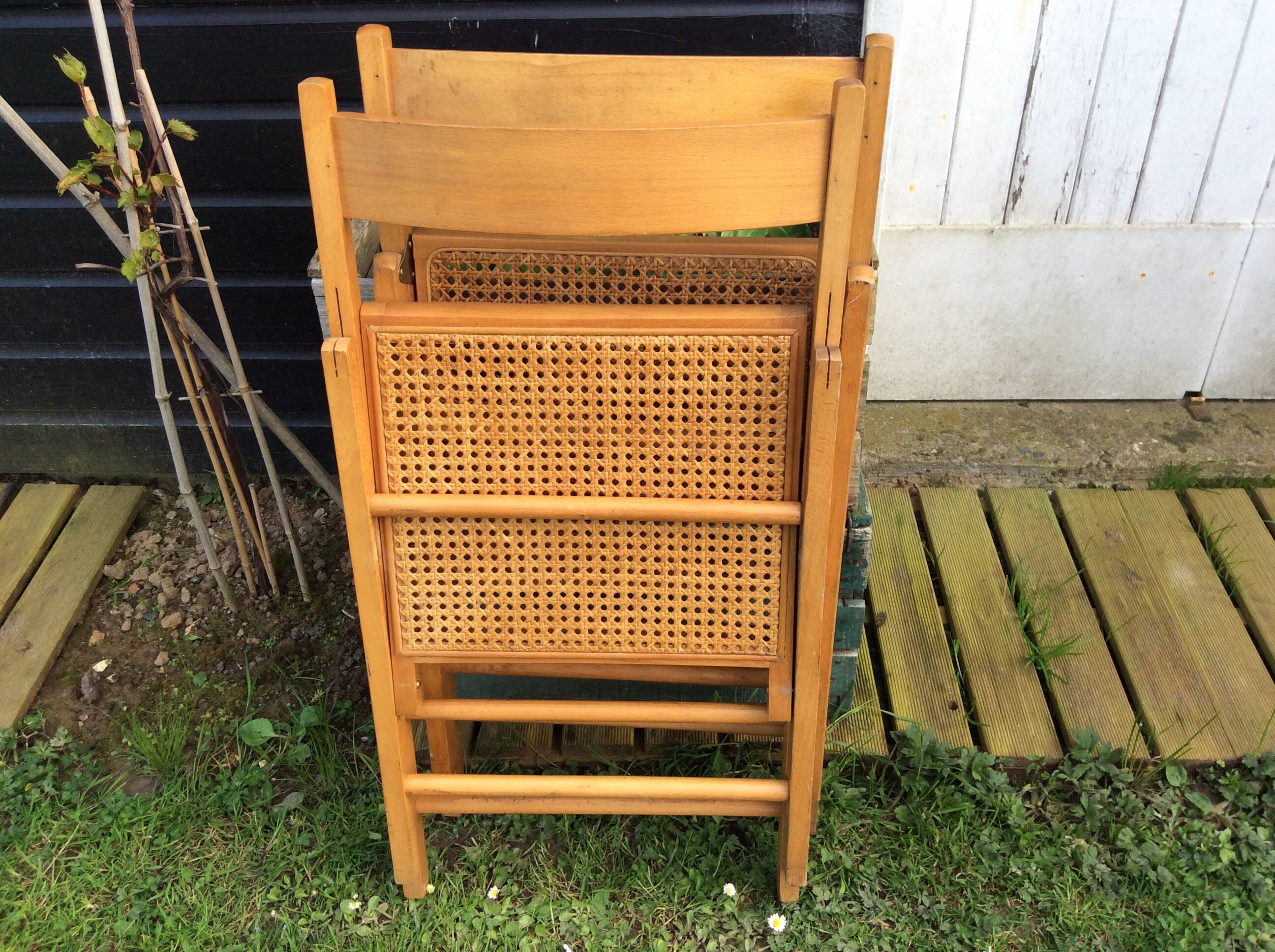 Wooden and cane folding chairs