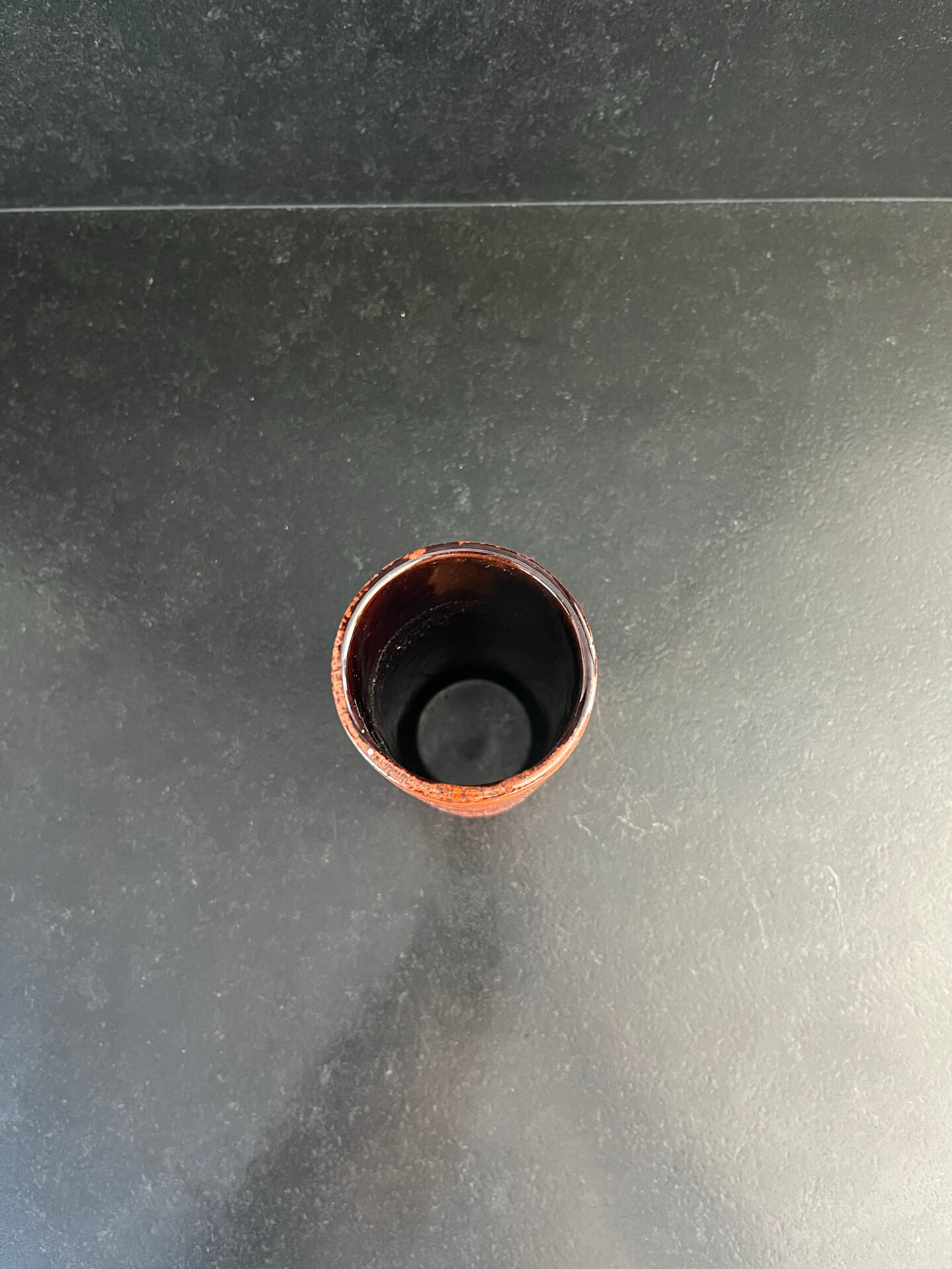Orange glazed ceramic cylinder vase