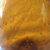 Bulgy blown and bubble glass carafe amber