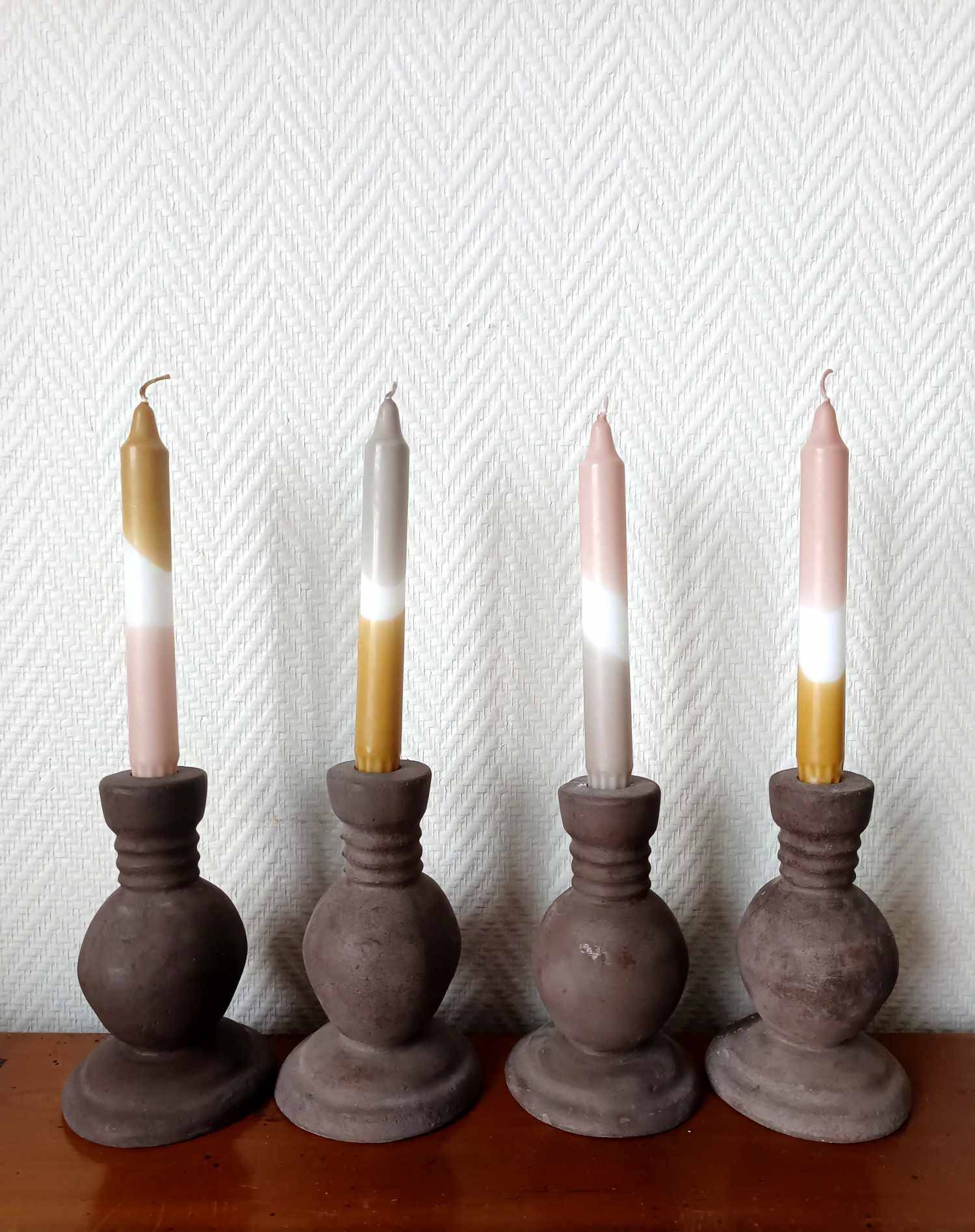 Four vintage handcrafted candle holders