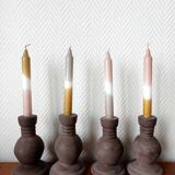 Four vintage handcrafted candle holders