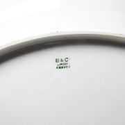 Service plate Bernardaud Limoges porcelain with floral decoration from the 1920s to 1950s.