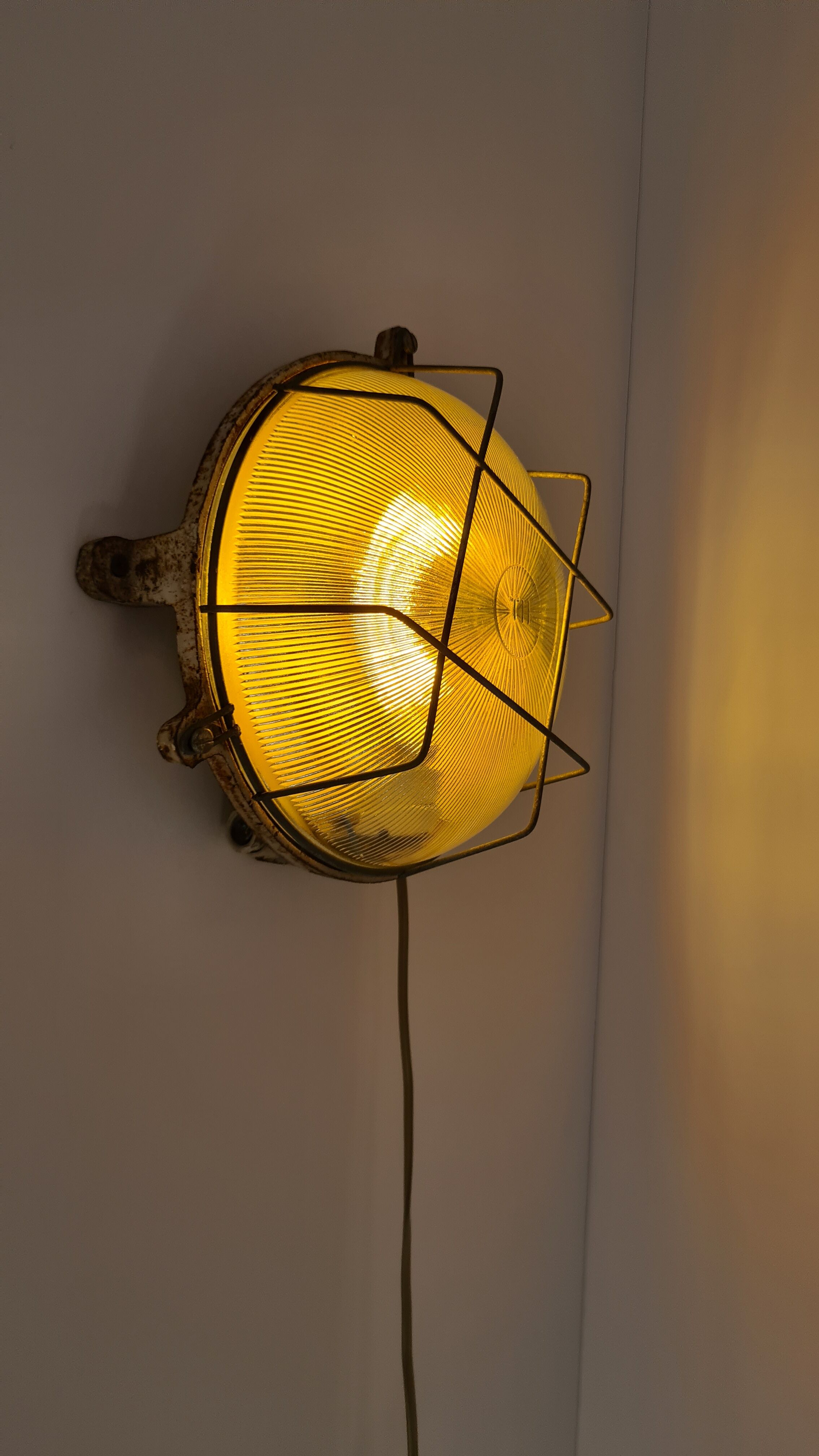 Cast iron porthole wall lamp by TH