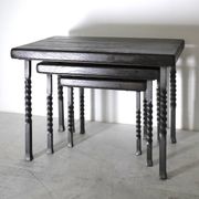 Brutalist nesting table in ebonized oak and wrought iron