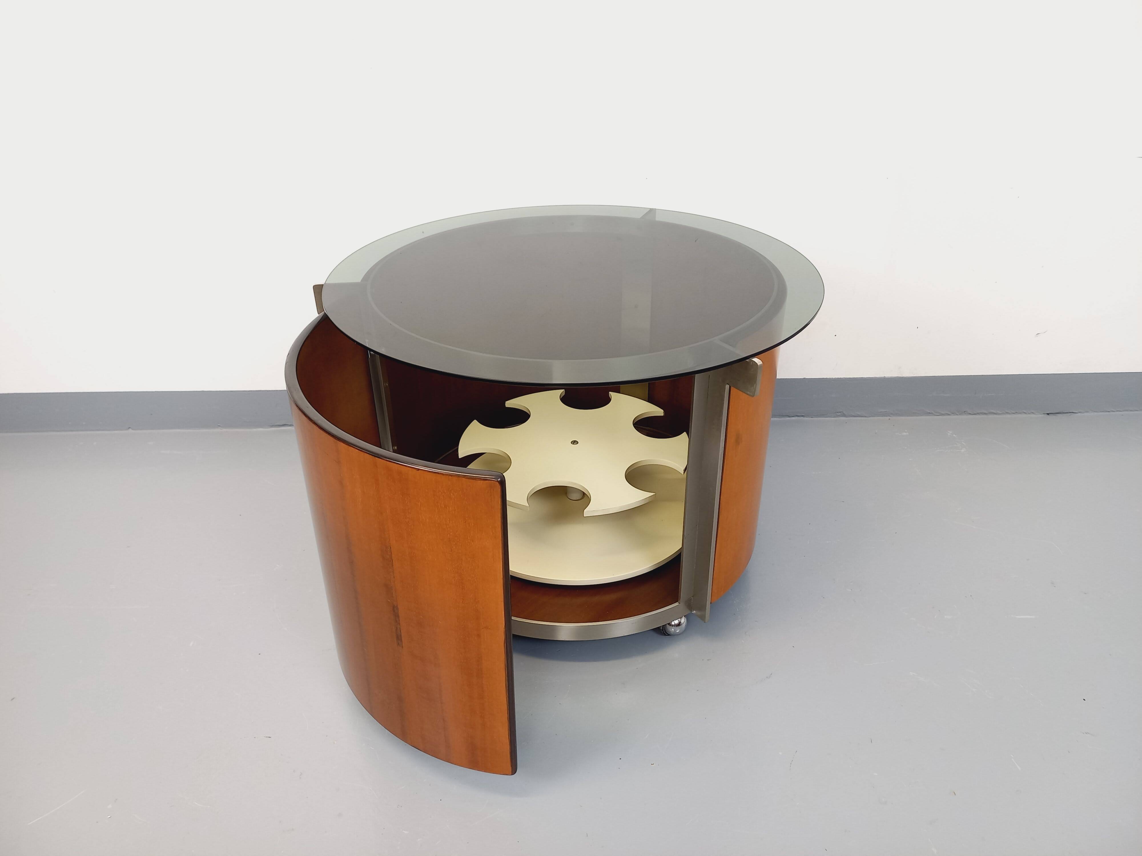 Round Italian teak coffee table swivel bar by Eugenio Gerli for Tecno