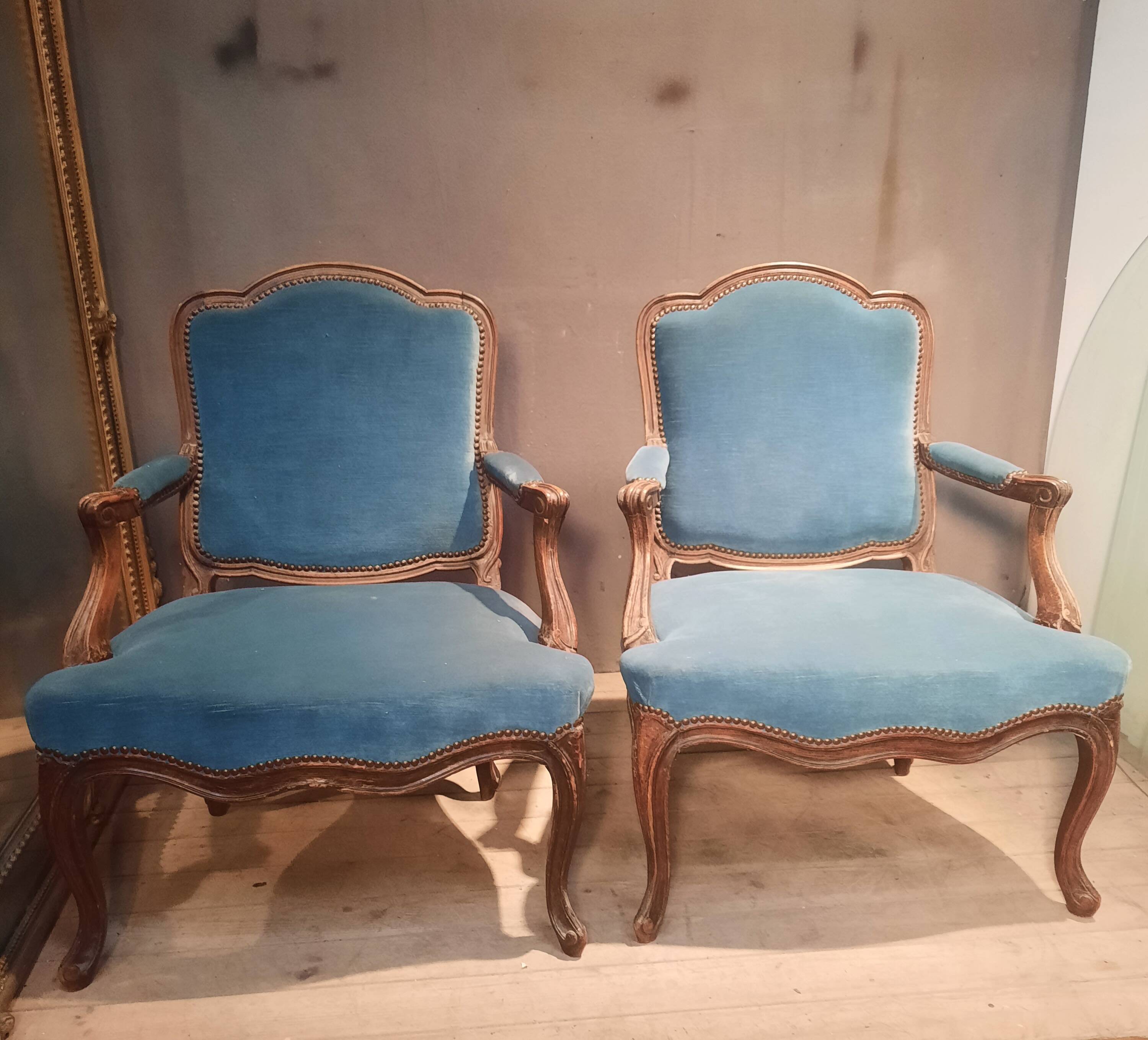Pair of large armchairs in Louis XV style from the 19th century.