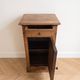 Antique bedside table in waxed wood