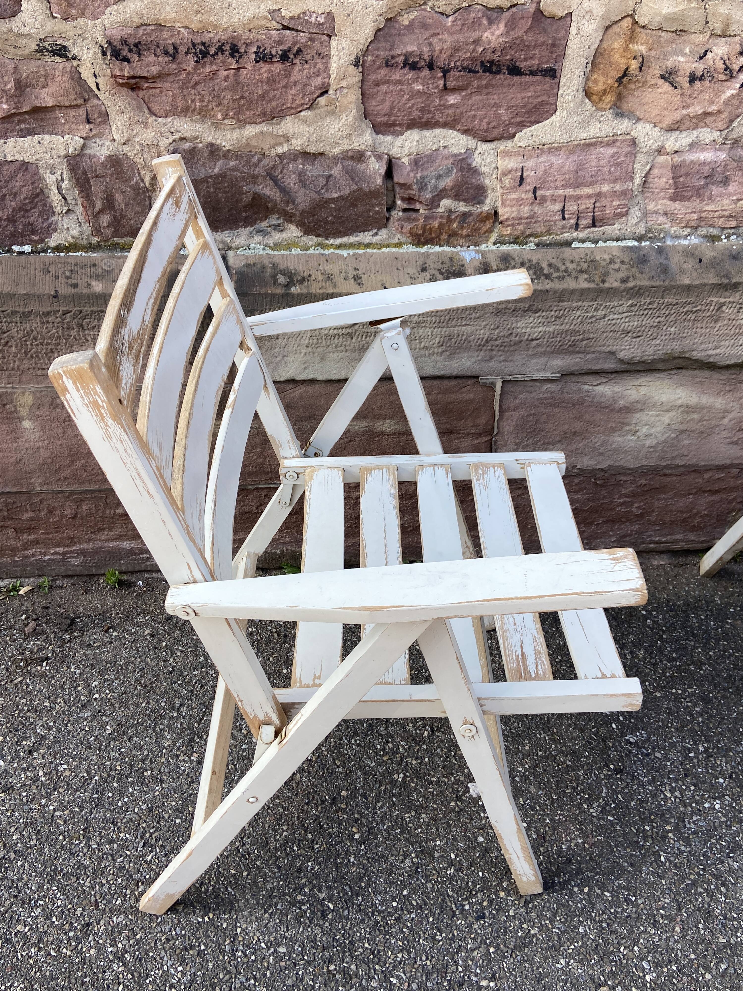 duo of folding garden armchairs brasserie cafe terrace Brasserie