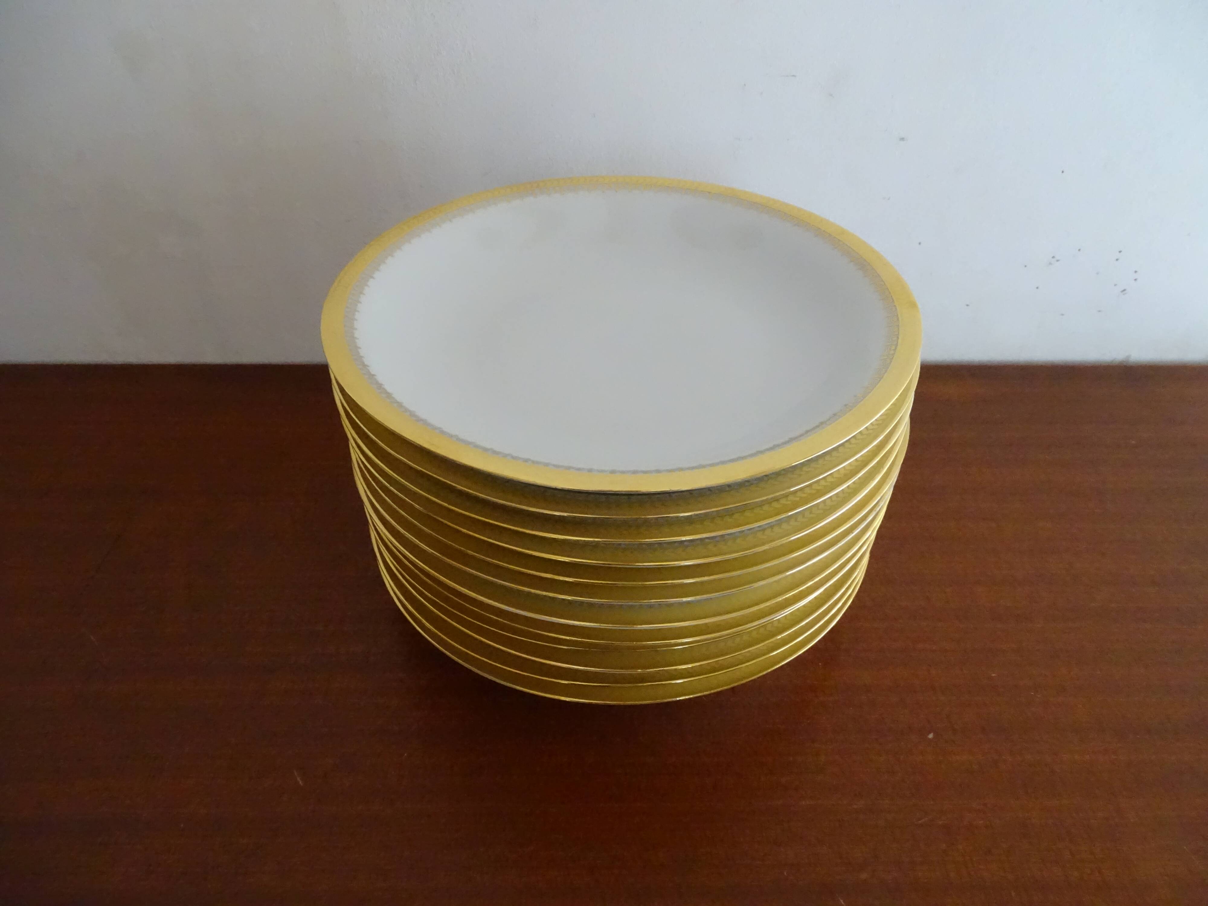 12 hollow plates porcelain of Sologne Larchevèque white and golden signed