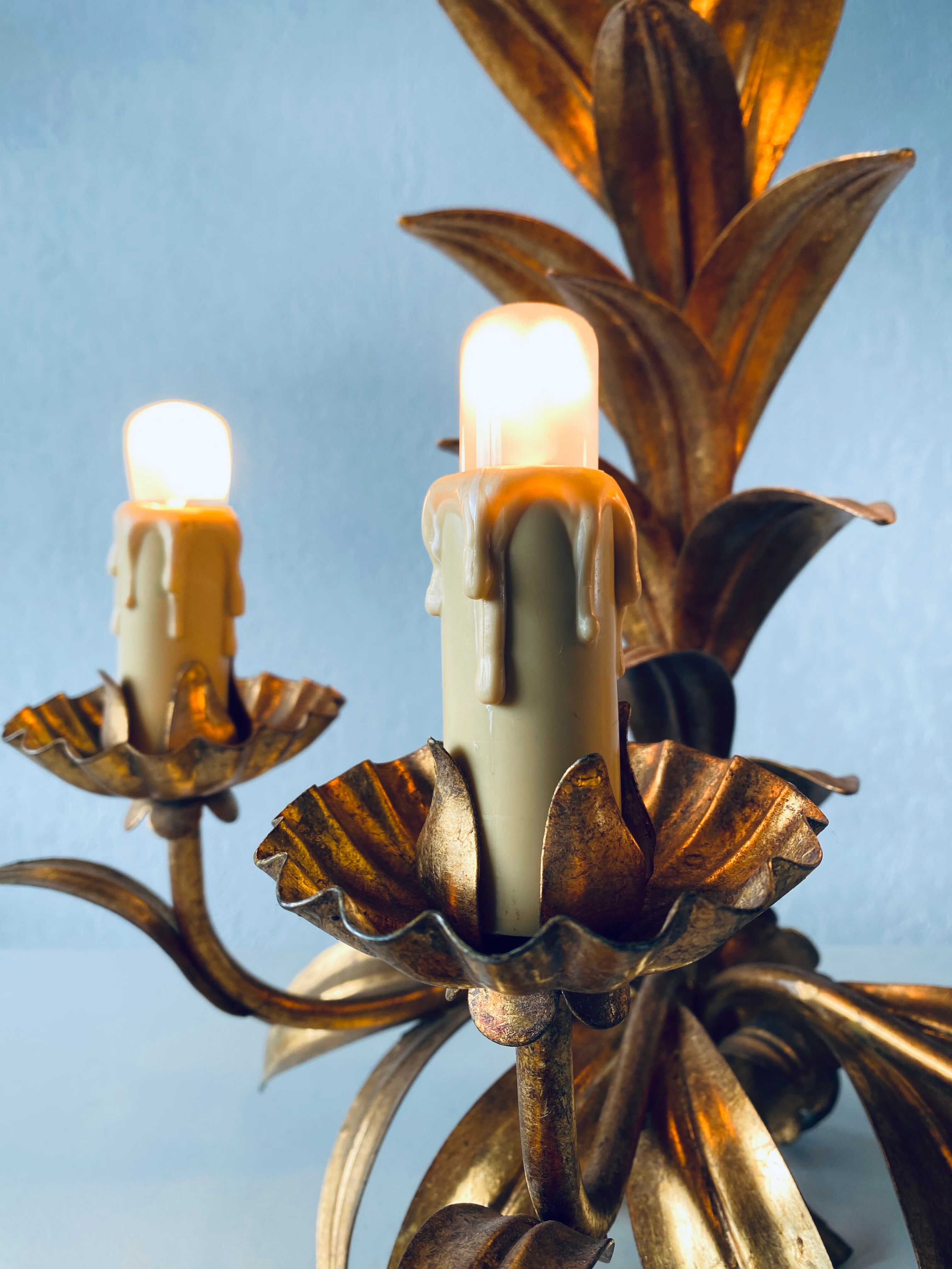 Golden leaf wall light