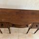 George III curved buffet in cherry wood, late 18th century.