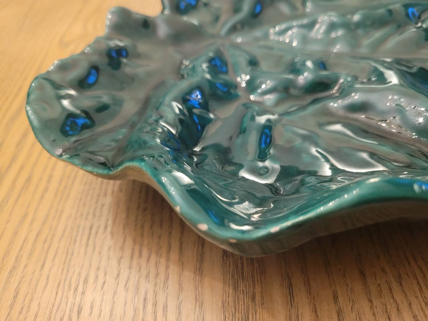 Large green enameled leaf dish