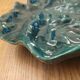 Large green enameled leaf dish
