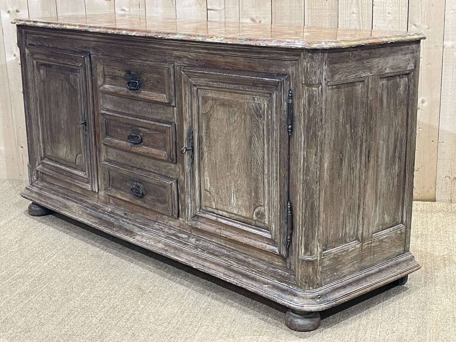 18th-century oak enfilade with a marble-effect painted top.