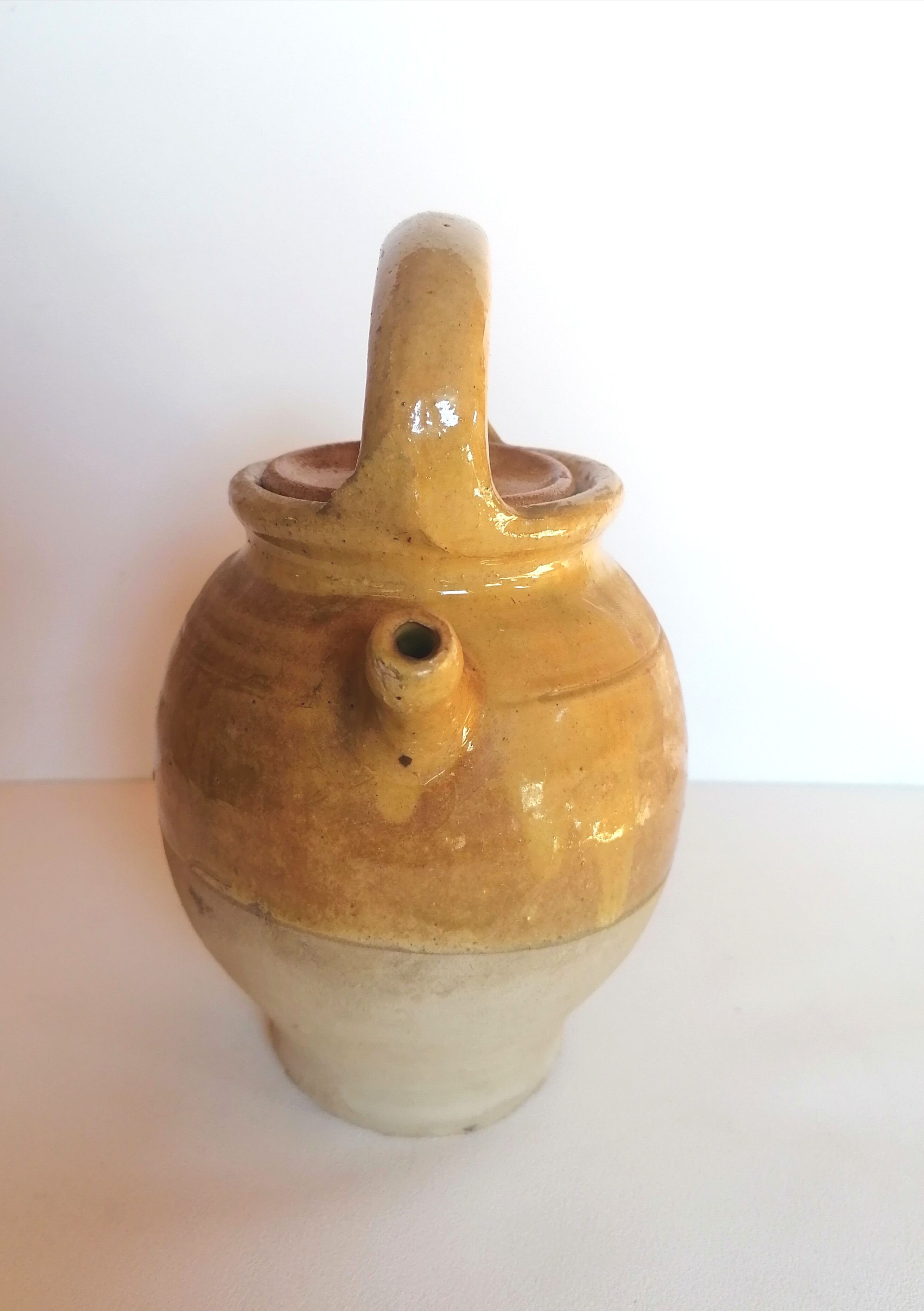 Enamelled jug with lid