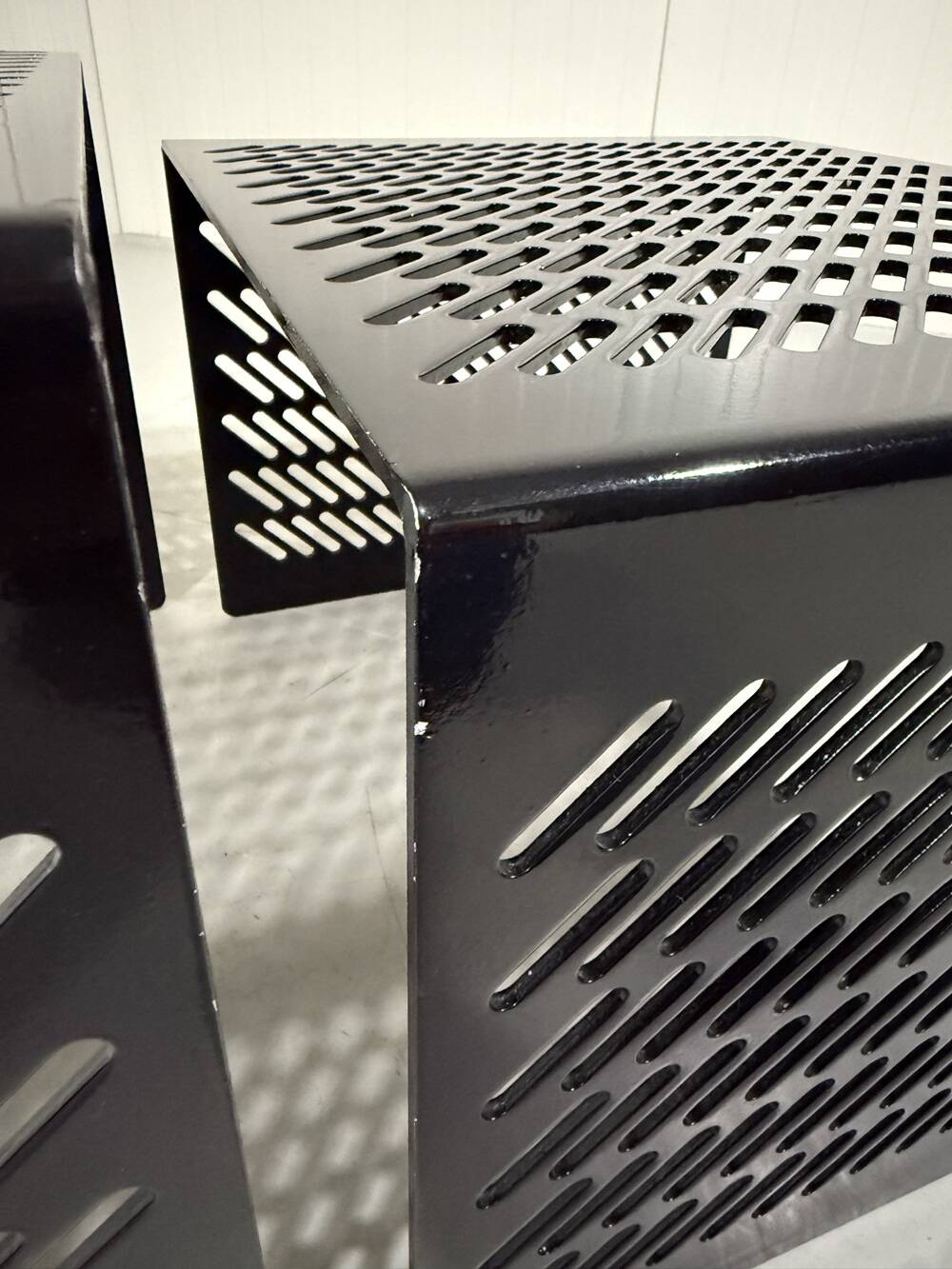 Black perforated steel nesting tables Italy 1980’s