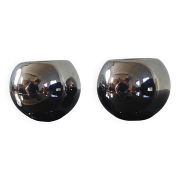 Pair of candle holders / spherical ceramic tealight holders with a silver effect.