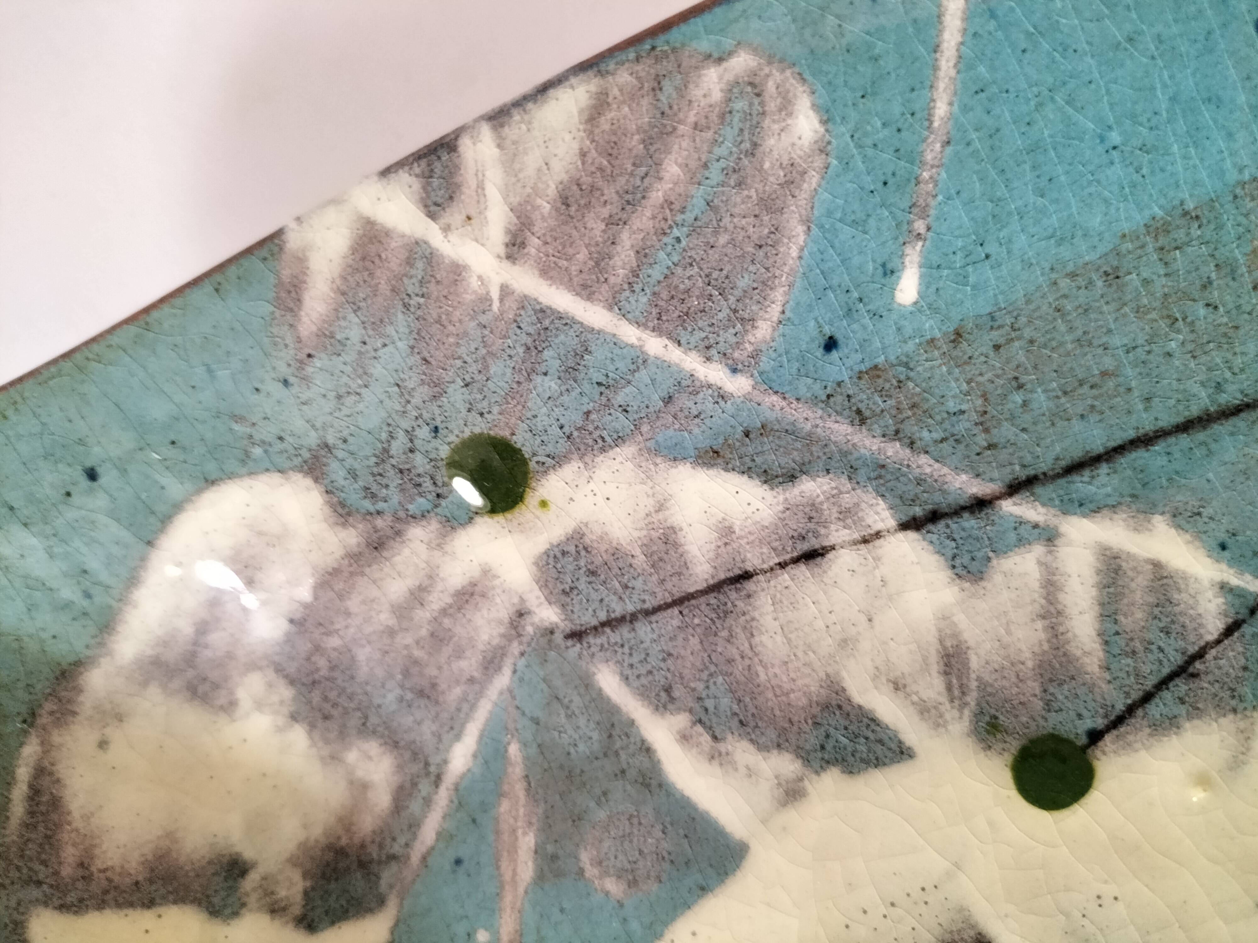 Square turquoise glazed stoneware dish, abstract floral decoration, signed.