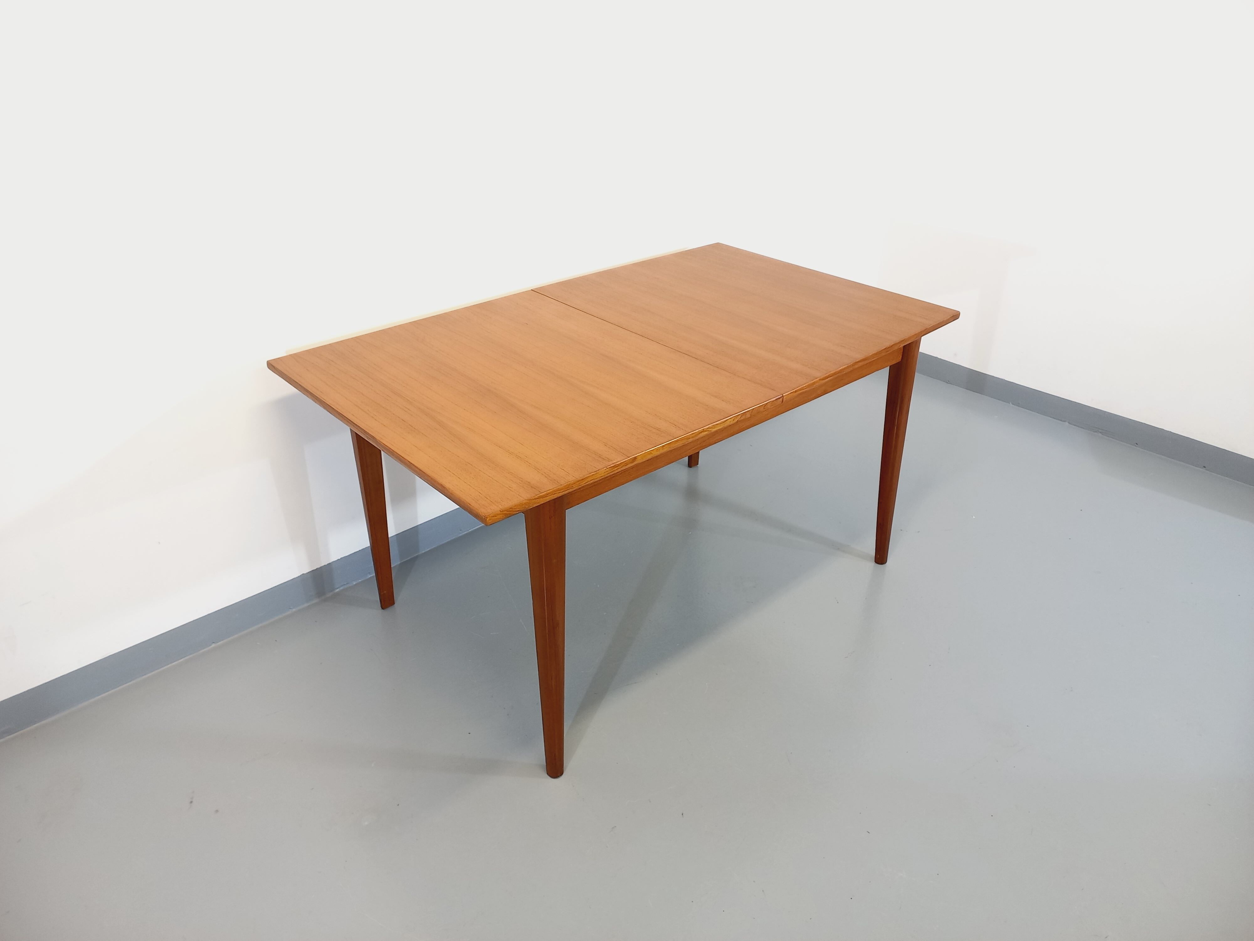 Vintage Scandinavian dining table from 50s 60s teak with extension