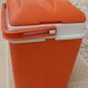 Glaciere vintage de couleur orange avec poignet  de marque EDA