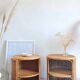 Pair of wicker bedside tables circa the 1970s.