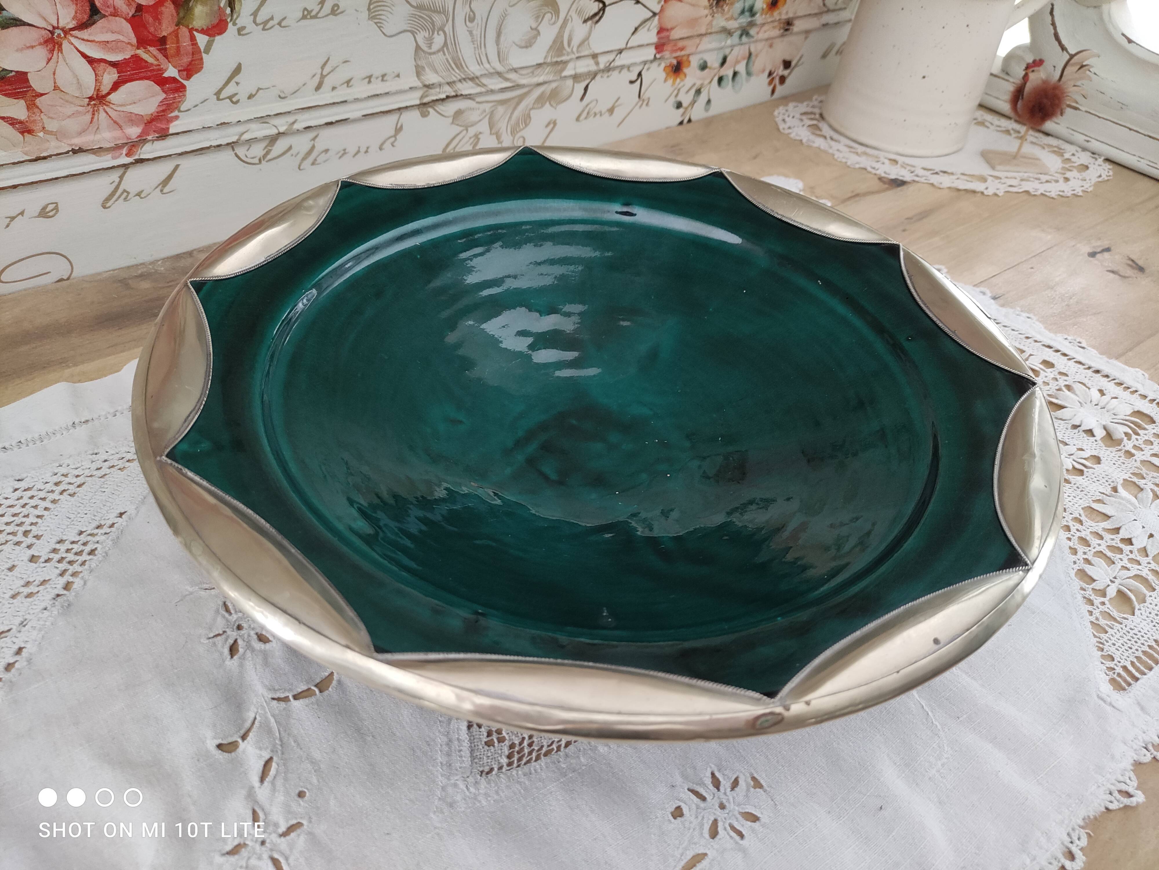 Round oriental hollow dish in deep green ceramic and silver colored metal