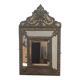 Mirror with brass repoussé frame